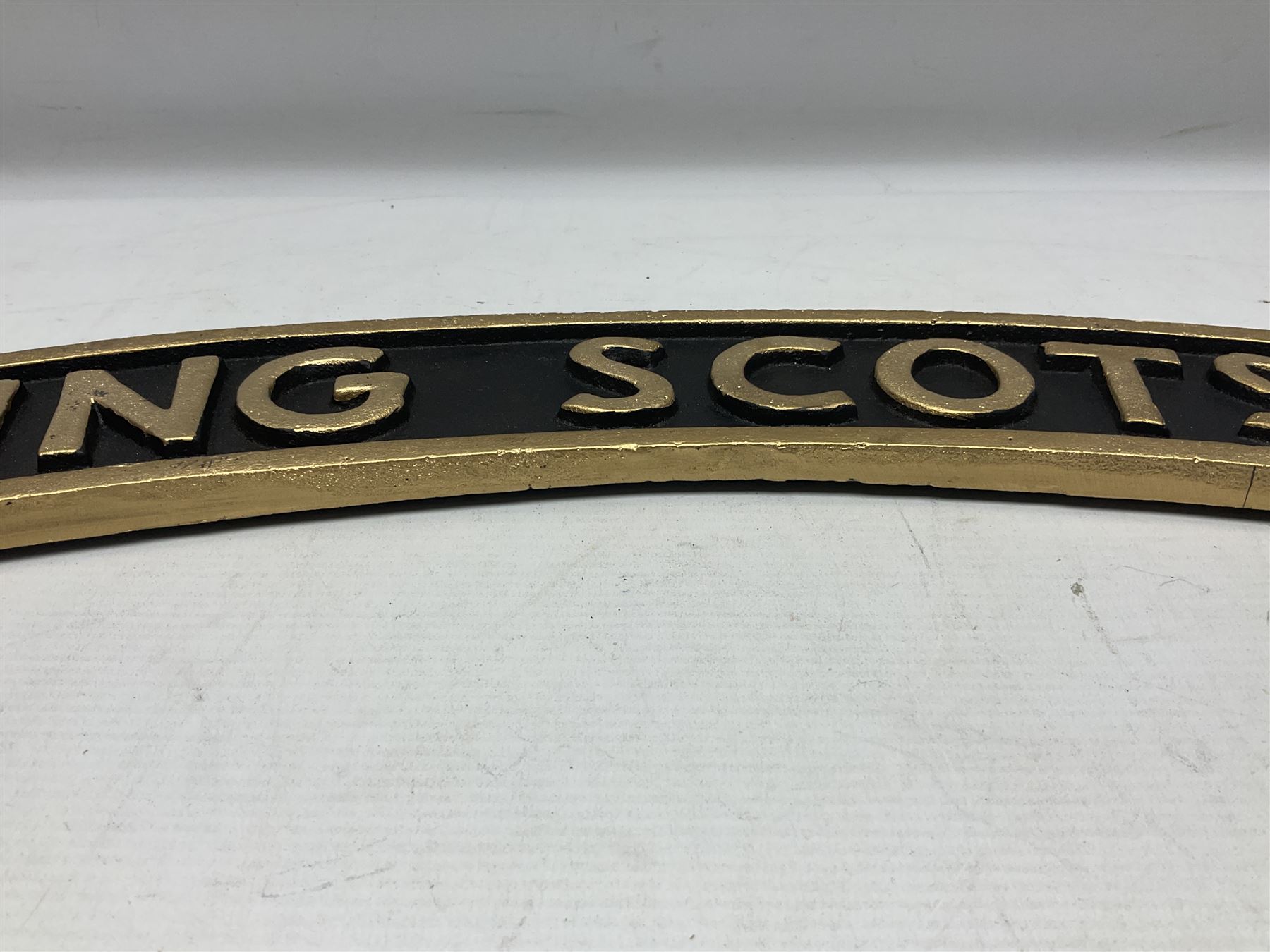 Cast iron Flying Scotsman arched railway type sign, L70cm