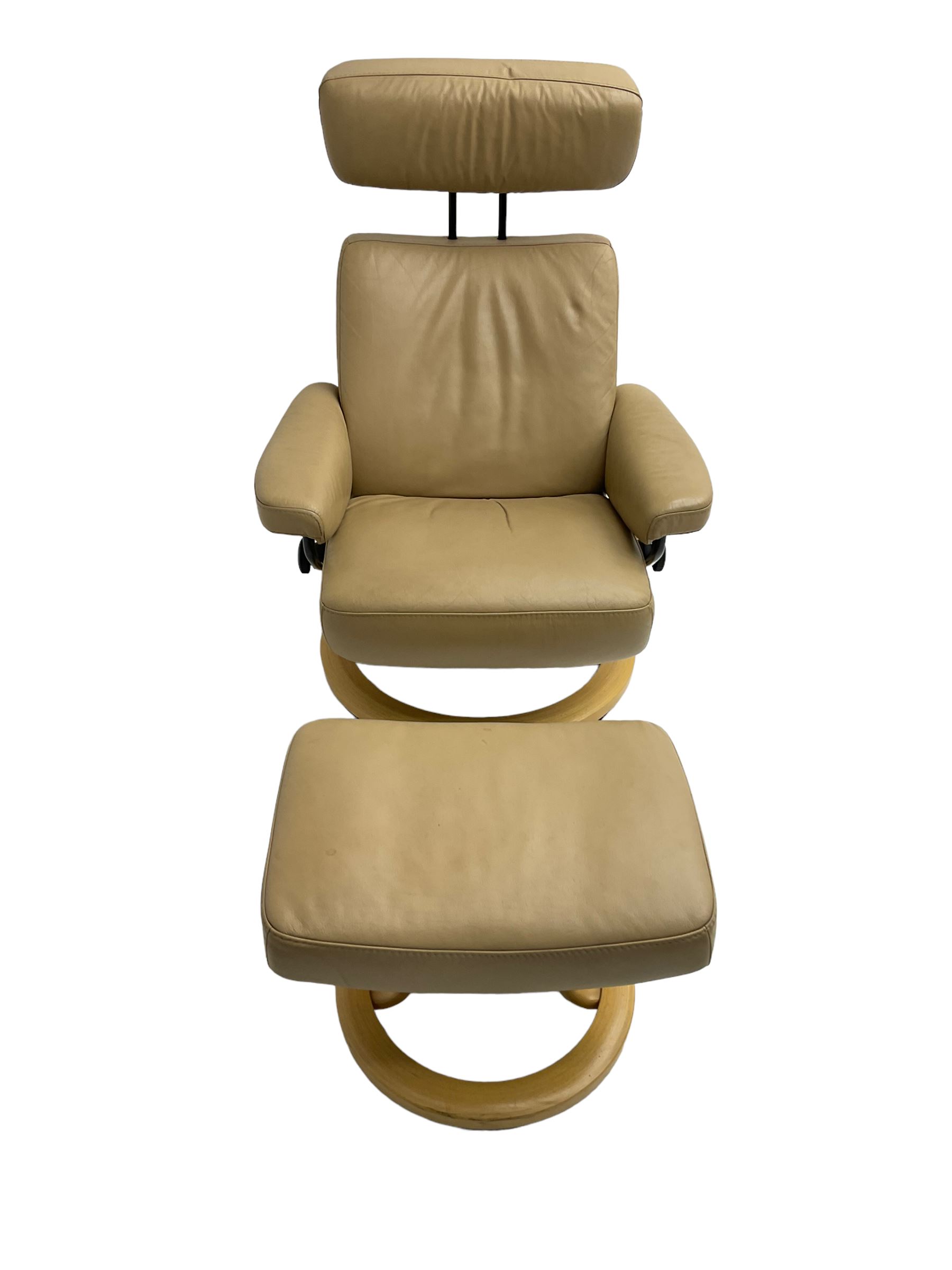 Ekornes Stressless - reclining armchair upholstered in latte leather, with footstool