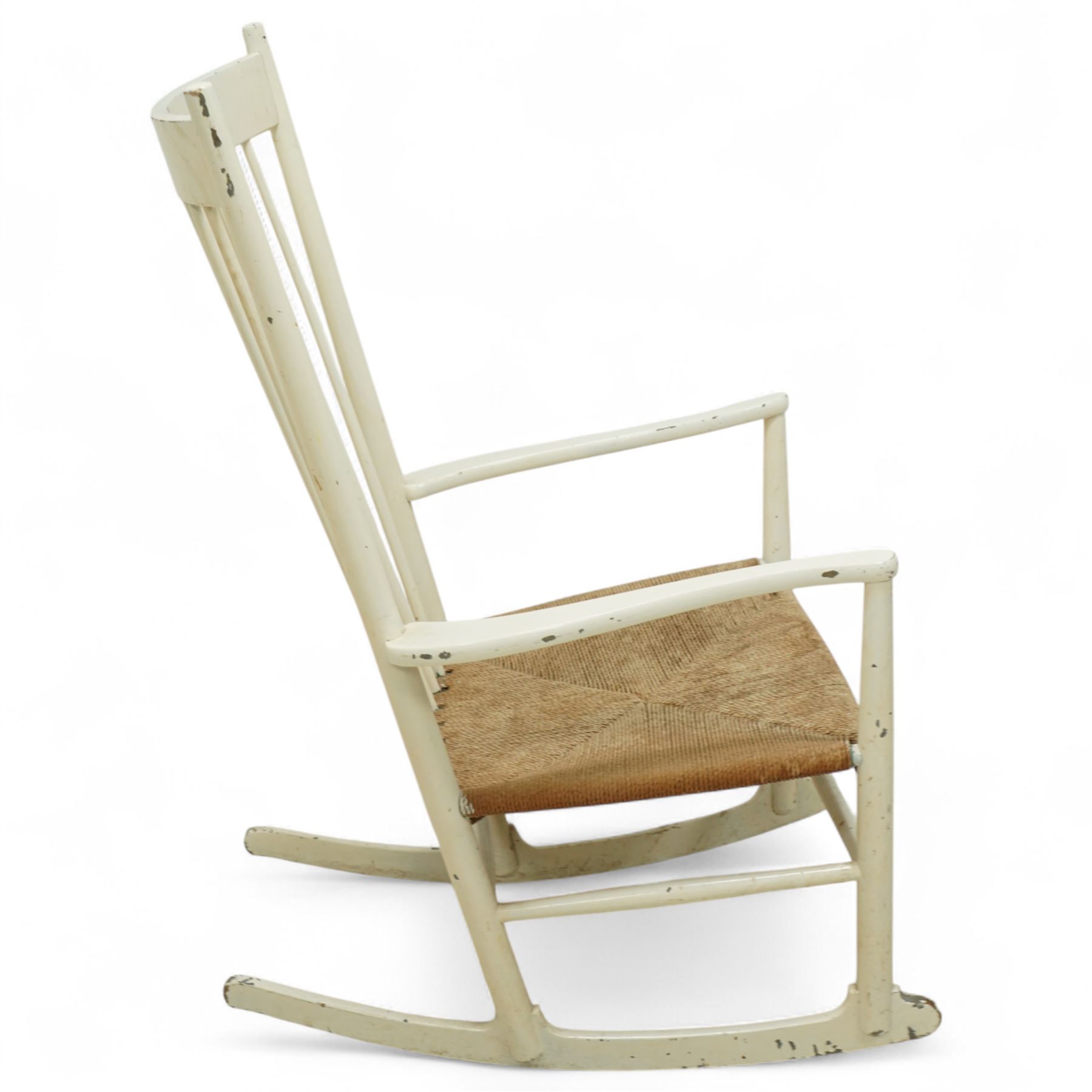 Hans J. Wegner (Danish: 1914-2007) - 'J16' beech framed rocking chair, stamped 'FDB Møbler Made in Denmark', rush seat out swept arms with a gently curved rockers