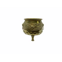20th Century brass planter with lion mask handles, embossed thistle decoration and three claw feet, H33cm, D32cm.   