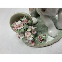 Six Lladro figures, comprising Naughty Dog no 4982, Best Friend 7620 and My Buddy no 7609, Kitty Confrontation no 1442, It Wasn't Me no 7672 and Rabbit Eating no 4772, three with original boxes, largest example H22cm