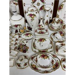 Royal Albert Old Country Roses pattern ceramics, to include table lamp, lidded vase, two pairs of salt and pepper shakers, cups and saucers, plates, biscuit jar, bowls, lidded preserve pot, vases, dishes, knives, napkin rings, lidded jars and box, pair of candlesticks etc
