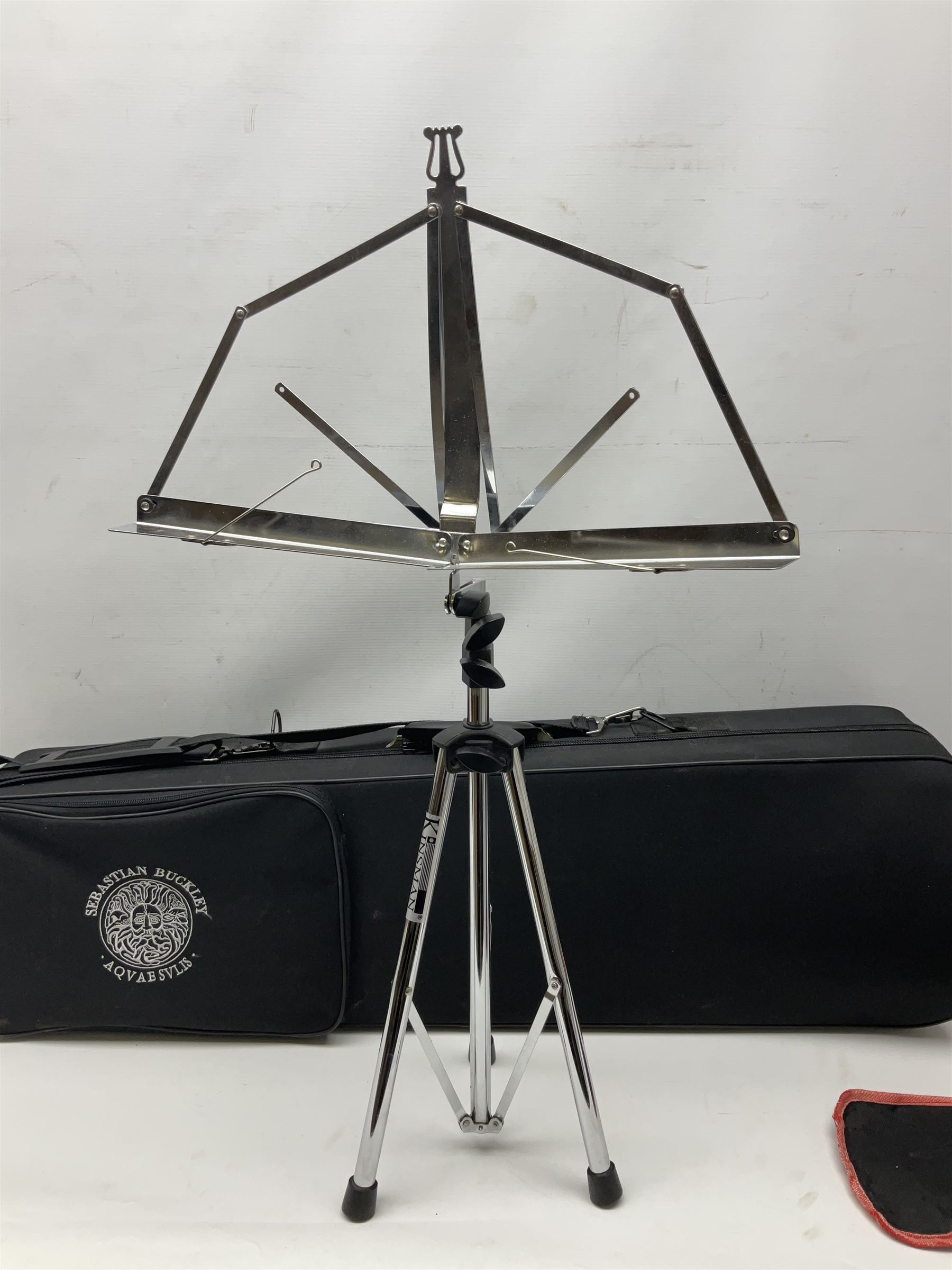 Sebastian Bucklet Aquae Sulis copper and brass trombone No.0910004; in lightweight carrying case; and Kinsman folding tubular chrome music stand in case (2)