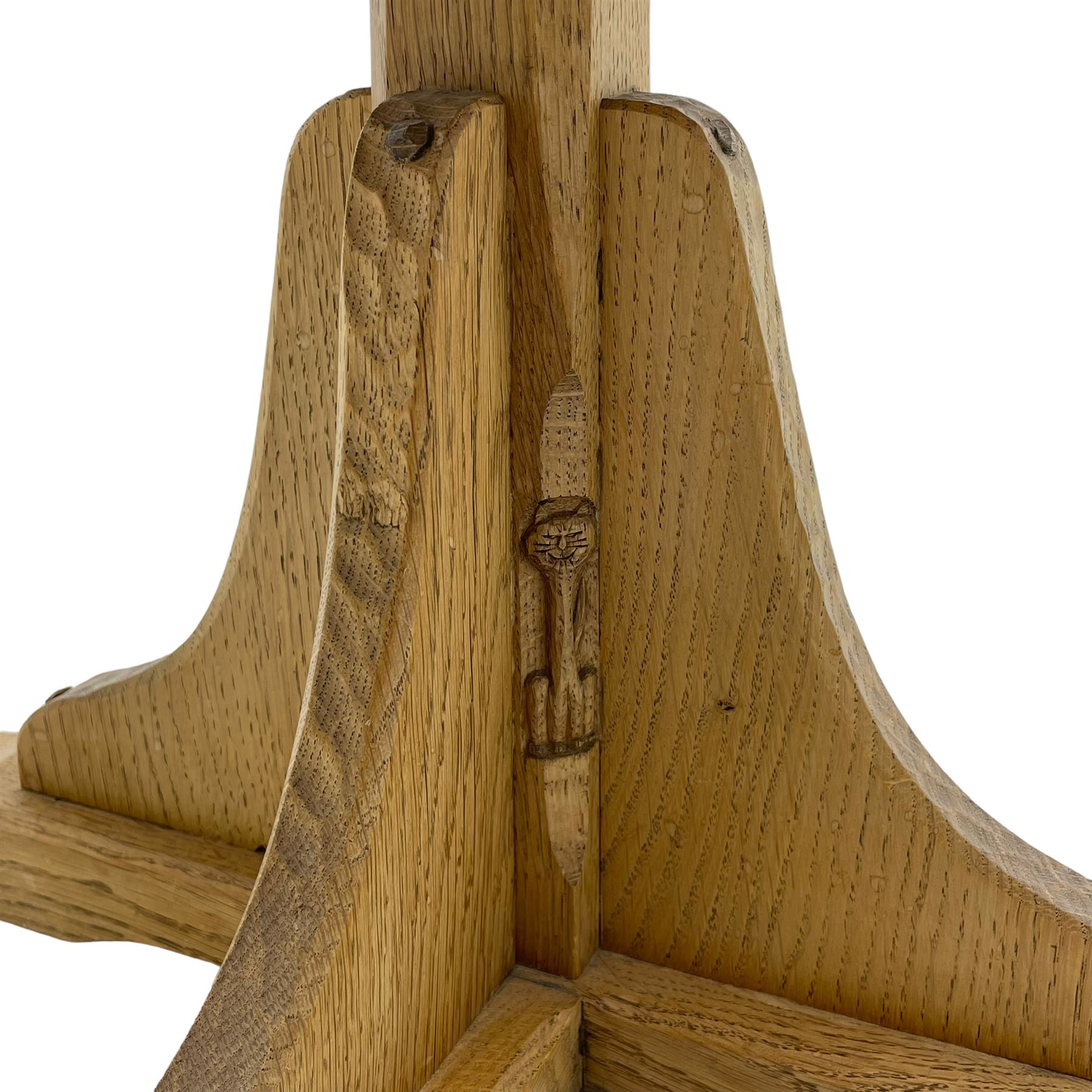 Catman - oak occasional table, circular top on cruciform base, carved with long-necked cat signature, by Chris Checkfield, Whitby