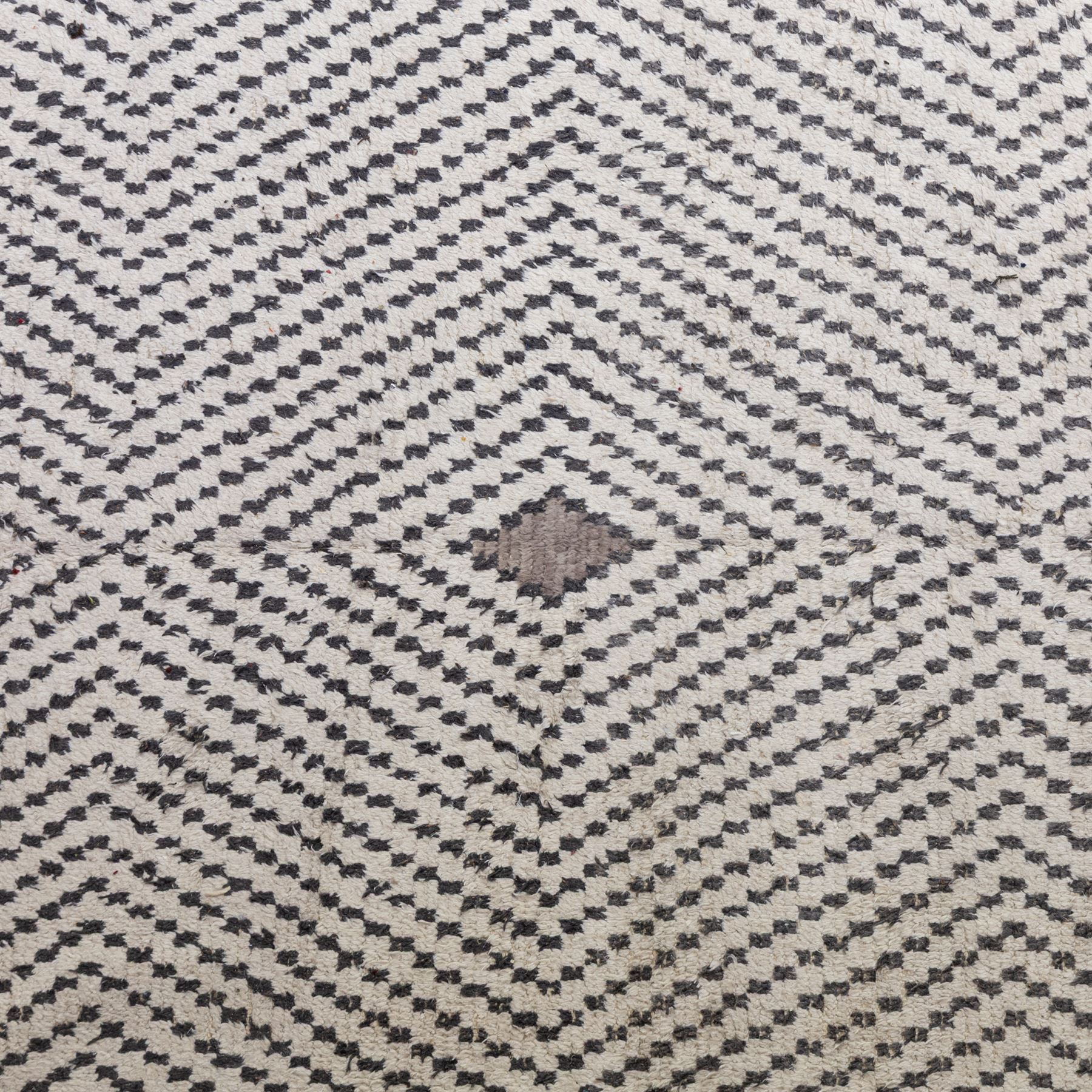 Contemporary Beni Ourain style wool rug, woven with a cream field and dark brown geometric chevron lattice, centred by repeating small diamond medallions, with short fringe ends
