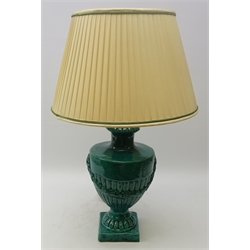  Green glazed urn shaped vase, half reeded body, applied with garland swags on square base with pleated shade (H71cm including shade)  