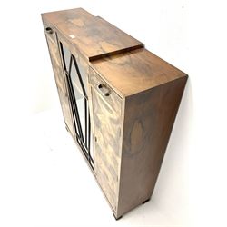 Art Deco walnut display cabinet, central astragal glazed door flanked by two drawers and two cupboards 