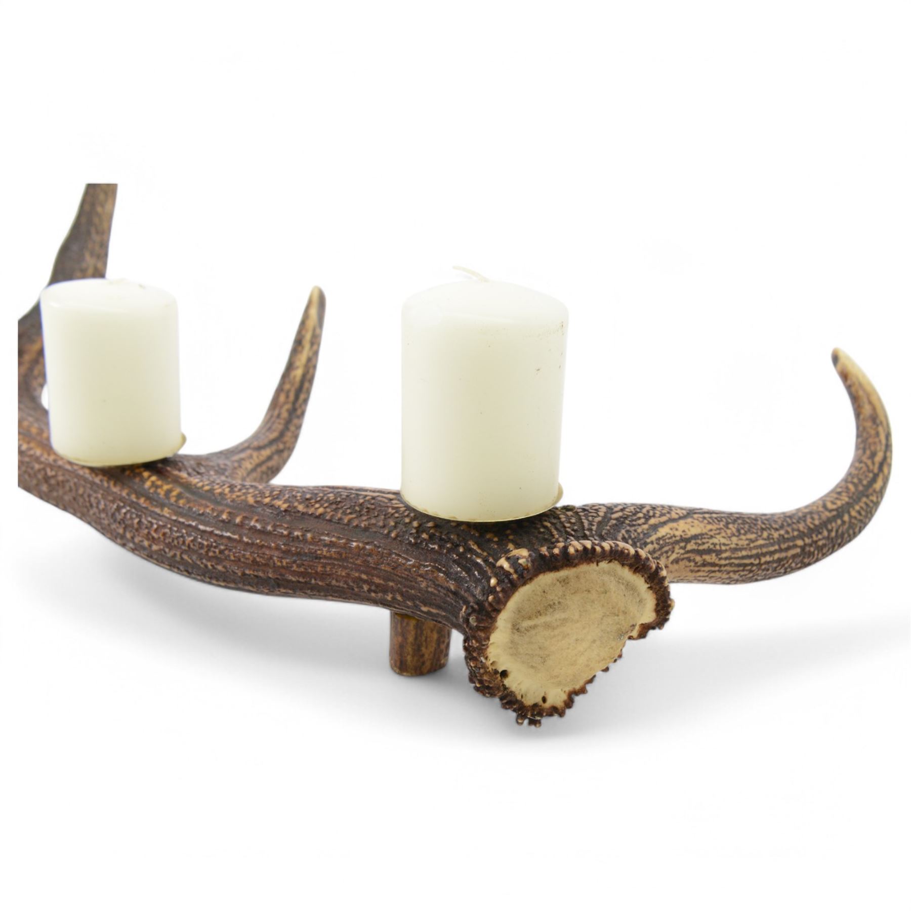 Red stag antler centre piece, made from a single antler with three candle holders to the centre, L78cm, H33cm  