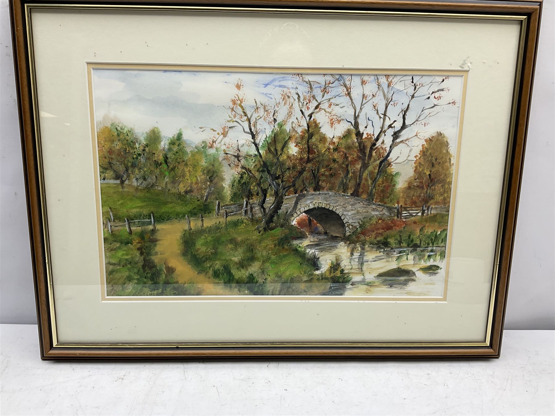 Albert Saunders (Northern British 20th century): 'Autumn at Coverdale Bridge in North Yorkshire Dales', watercolour signed, titled verso 28cm x 41cm
