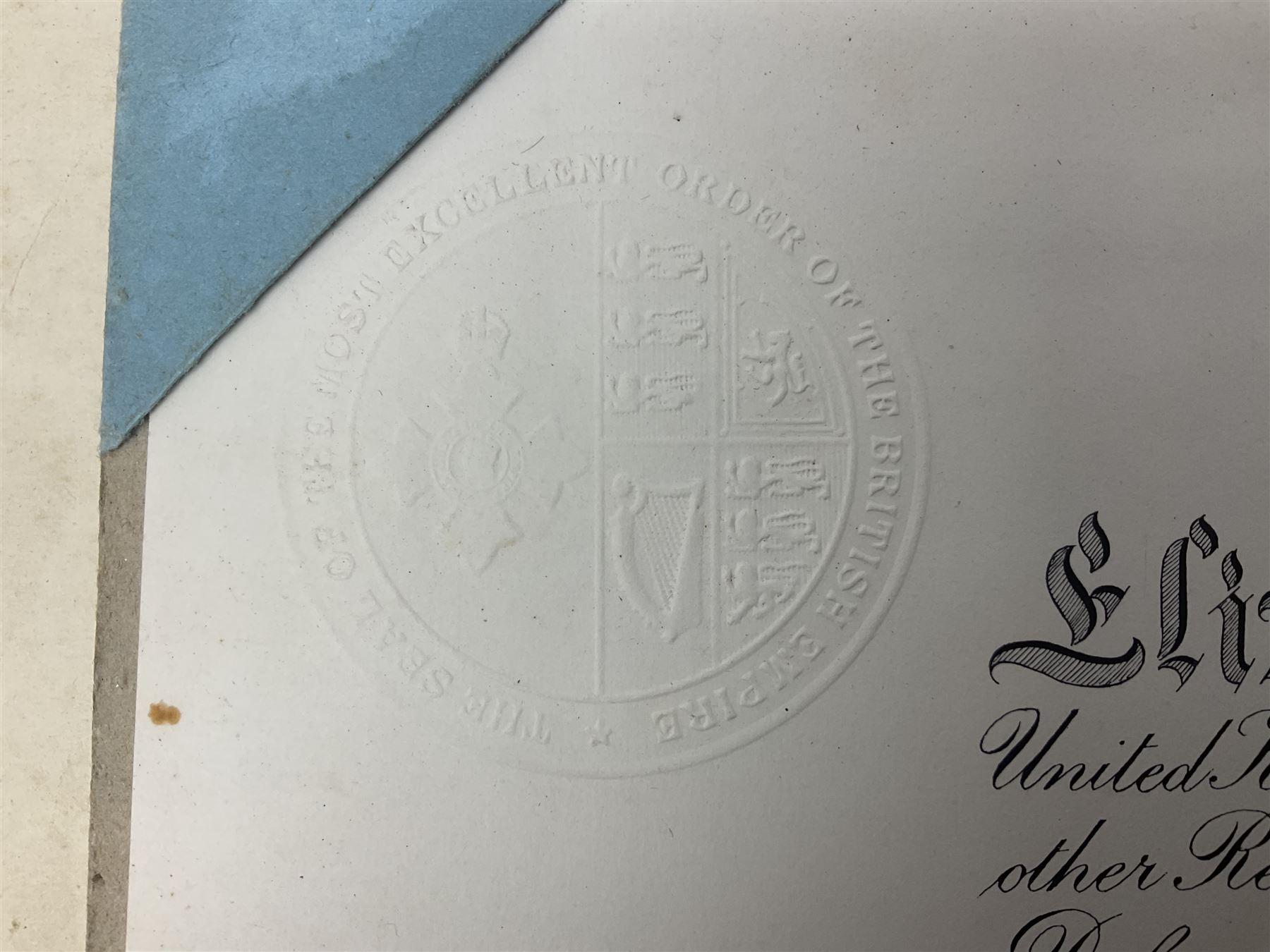 George VI Knight of the Garter cloth beret insignia with pin back and photograph of the Knight's Robes; Edmund Fellowes book on The Knights of the Garter 1348-1939; together with EIIR civilian OBE certificate to Jeffery Stanford Agate with facsimile signatures of Elizabeth II and Prince Philip
