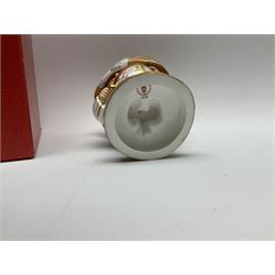 A Royal Crown Derby Mansion House dwarf, dressed in 17th century cavalier costume, with floral waistcoat and hate detailed Auction of Elegant Household Furniture and Effects, H18cm, with printed mark beneath and signed J.Aston, with makers box. 