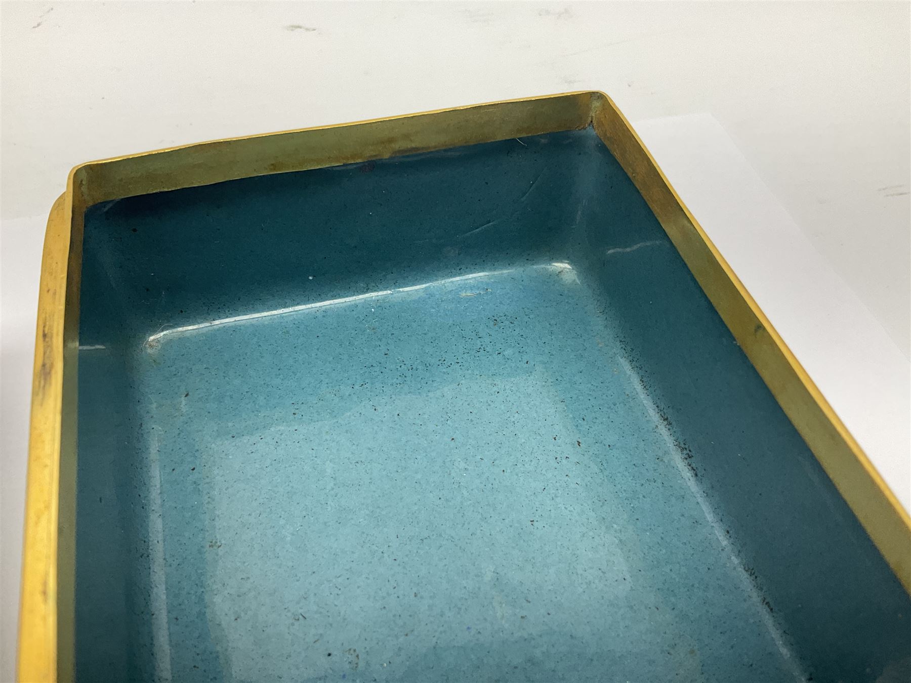 20th century Chinese cloisonne enamel smoking set, comprising two ashtrays, box and tray, with floral and foliate scrolling on green ground