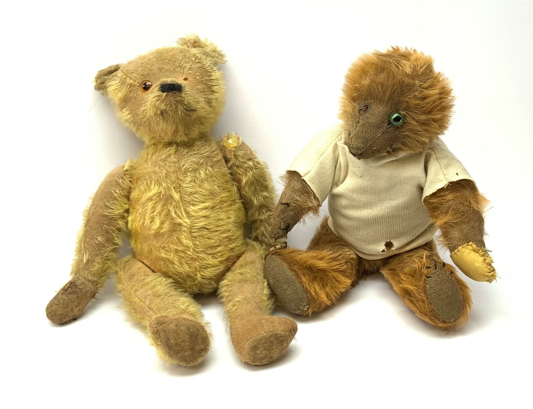 Early 20th century cinnamon coloured bear c1920, possibly continental, with unusual hedgehog styled head/face, swivel jointed head, wood wool filled body with jointed limbs, five claw stitches to feet  and inoperative growler mechanism H16