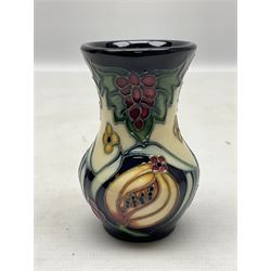 Small Moorcroft vase decorated in Sacred Fruit pattern, with printed and painted marks beneath, H8cm