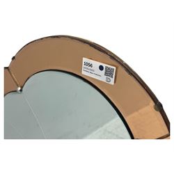 Frameless art deco mirror, scalloped copper tinted border central fan motif, bevelled edges with decorative screw caps