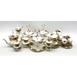 Royal Albert Old Country Roses teawares and cake stands, comprising tea pot, six tea cups and saucers, coffee pot, six coffee cups and saucers, milk jug, cream jug and two sugar bowls, three tier cake stands and  twelve side plates. 