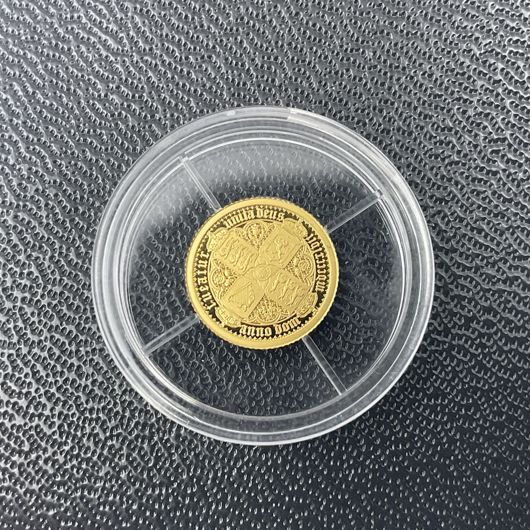 Eleven Queen Elizabeth II miniature gold coins, each being 0.5 grams of 24 carat gold, including Tristan da Cunha 2020 'Laurel', Solomon Islands 2020 '80th Anniversary of the Battle of Britain' etc, all with certificates