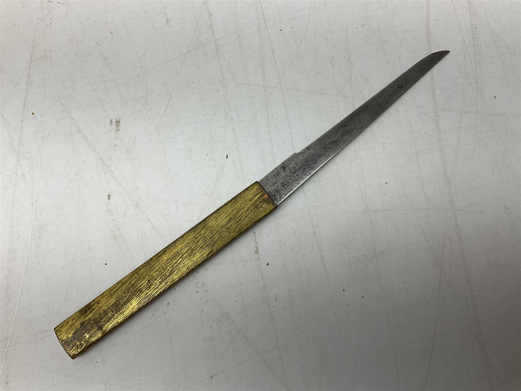 Japanese Tanto with 28.5cm steel blade and cord bound grip; in red spotted black lacquer saya containing a kogai knife with etched characters to the blade and ornate fern leaf and snake handle