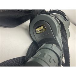 Yukon rubber armoured compact variable power spotting scope (boxed), together with Bresser 10x50 binoculars, Bushnell Excursion 10x42 binoculars, camera equipment etc  