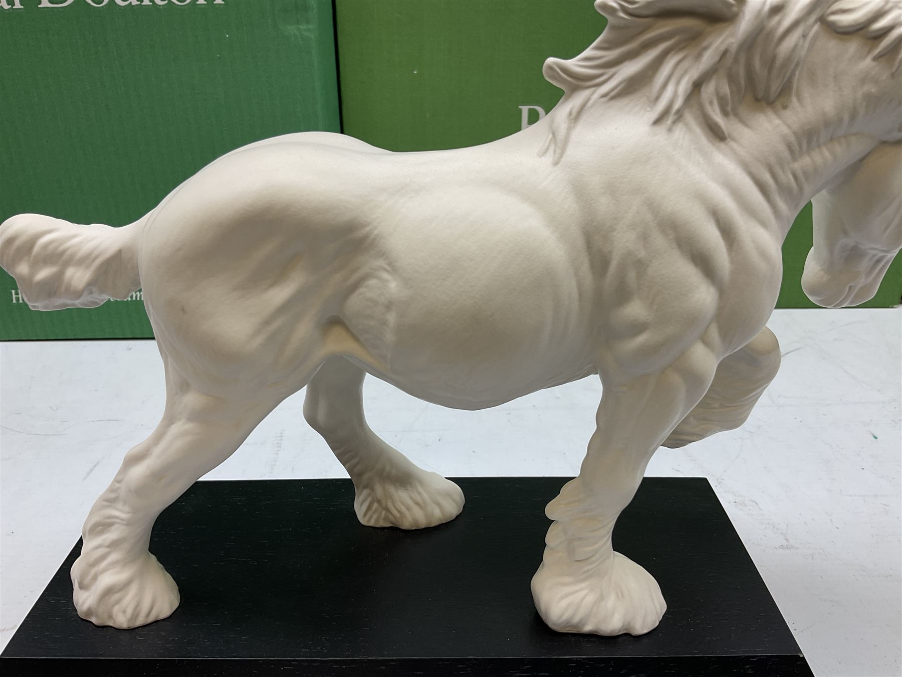 Five Beswick and Royal Doulton horse figures in matt white on black plinths, comprising of  Spirit of Affection no. 2689/2536, Springtime no.2837, Spirit of peace no.2916, Spirit of earth no.2914 and Spirit of the wild no. 183, together with a composite figure of a horse (6)