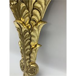Pair of carved giltwood wall shelves, upon carved foliate pillars, L43cm