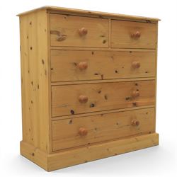 Solid pine chest, fitted with two short and three long drawers