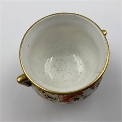 Group of Crown Derby and Royal Crown Derby Imari pattern miniatures, including mid 19th century Stevenson and Hancock cauldron, with painted mark beneath, H5.5cm, a near pair of early Royal Crown Derby scuttles, decorated in the 6299 pattern, each with printed and painted marks beneath including illustration date codes for 1913 and 1922, tallest 6.5cm, and a further early 20th century Royal Crown Derby scuttle, decorated in the 6299 pattern, with printed and painted marks beneath including illustration date code for 1922, H5.5cm, (4)
