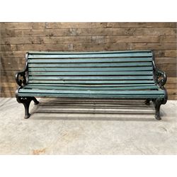 Early 20th century slatted garden bench with scrolling cast iron bench ends