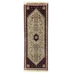 Persian Abadeh indigo ground runner rug, ivory field with pole medallion surrounded by plant and bird motifs and contrasting spandrels, border with interlaced flowerheads