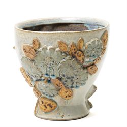 Bernard Rooke (b1938) - Stoneware vase decorated with a raised pattern of flower heads and...
