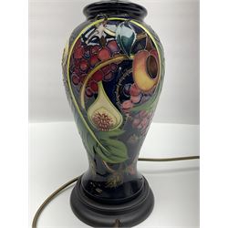 Moorcroft table lamp of baluster form, decorated in the Queens Choice pattern by Emma Bossons, H49cm