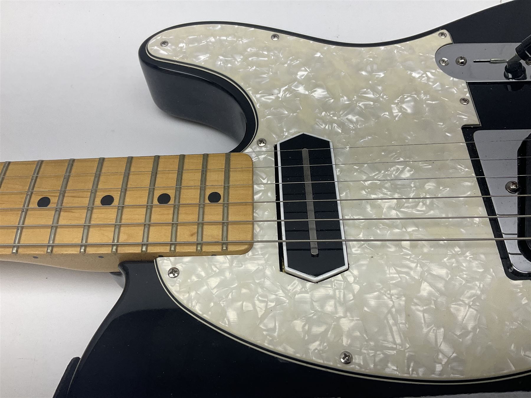 2009 Fender Telecaster electric guitar in black, retro fitted with Charlie Christian copy pick-up, serial no.MZ9546274; L98cm; in Fender soft carrying case