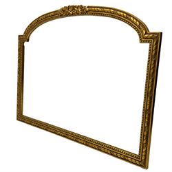 Large gilt framed overmantle mirror, arch top with carved pediment