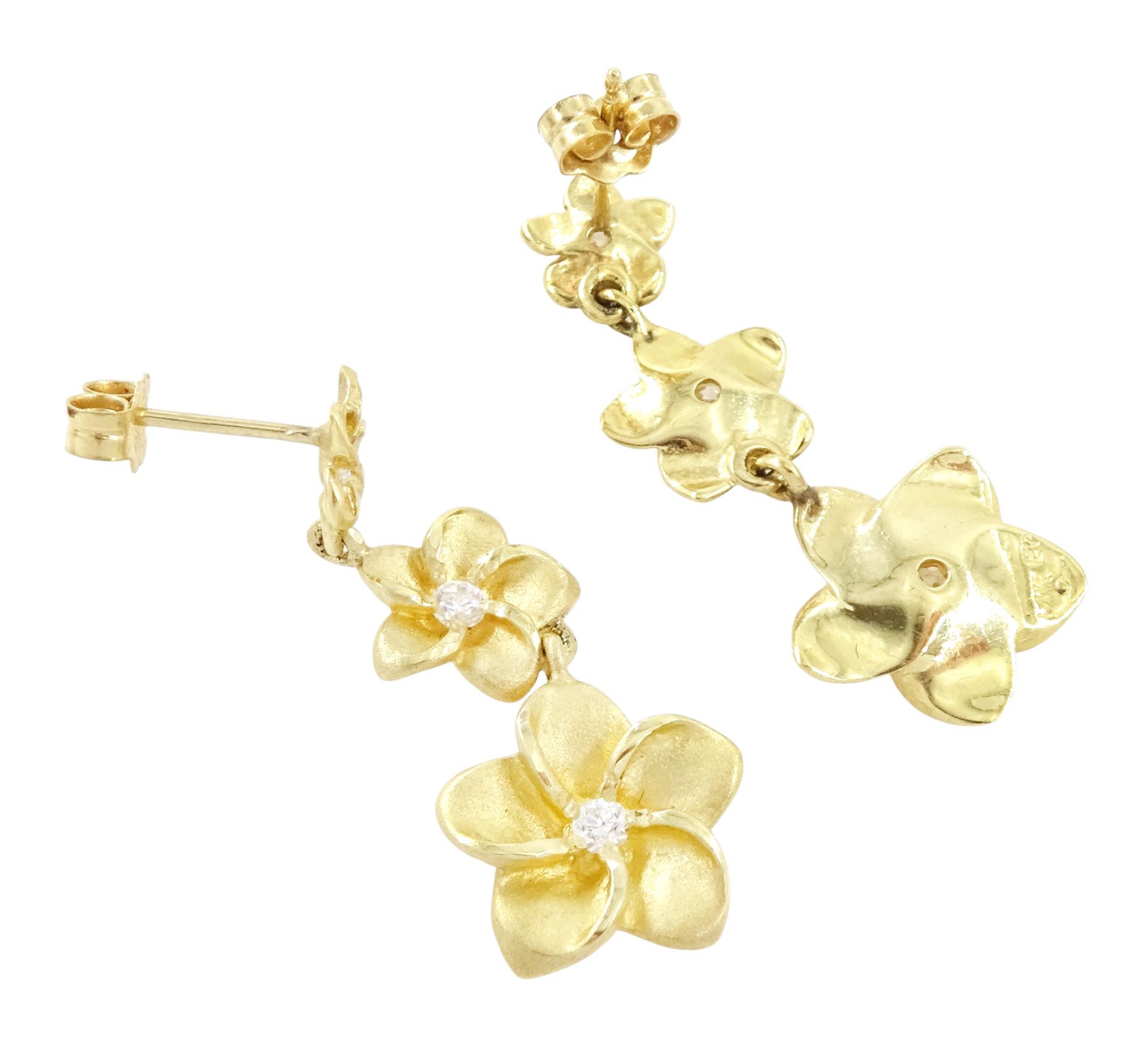 Pair of gold cubic zirconia flower head earrings, each stud with three graduating flowers, each set with a single cubic zirconia