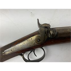 19th century 13-bore double barrel side-by-side percussion cap shotgun, the 72cm stub twist damascus barrels with ramrod under, walnut stock with chequered grip L117.5cm overall