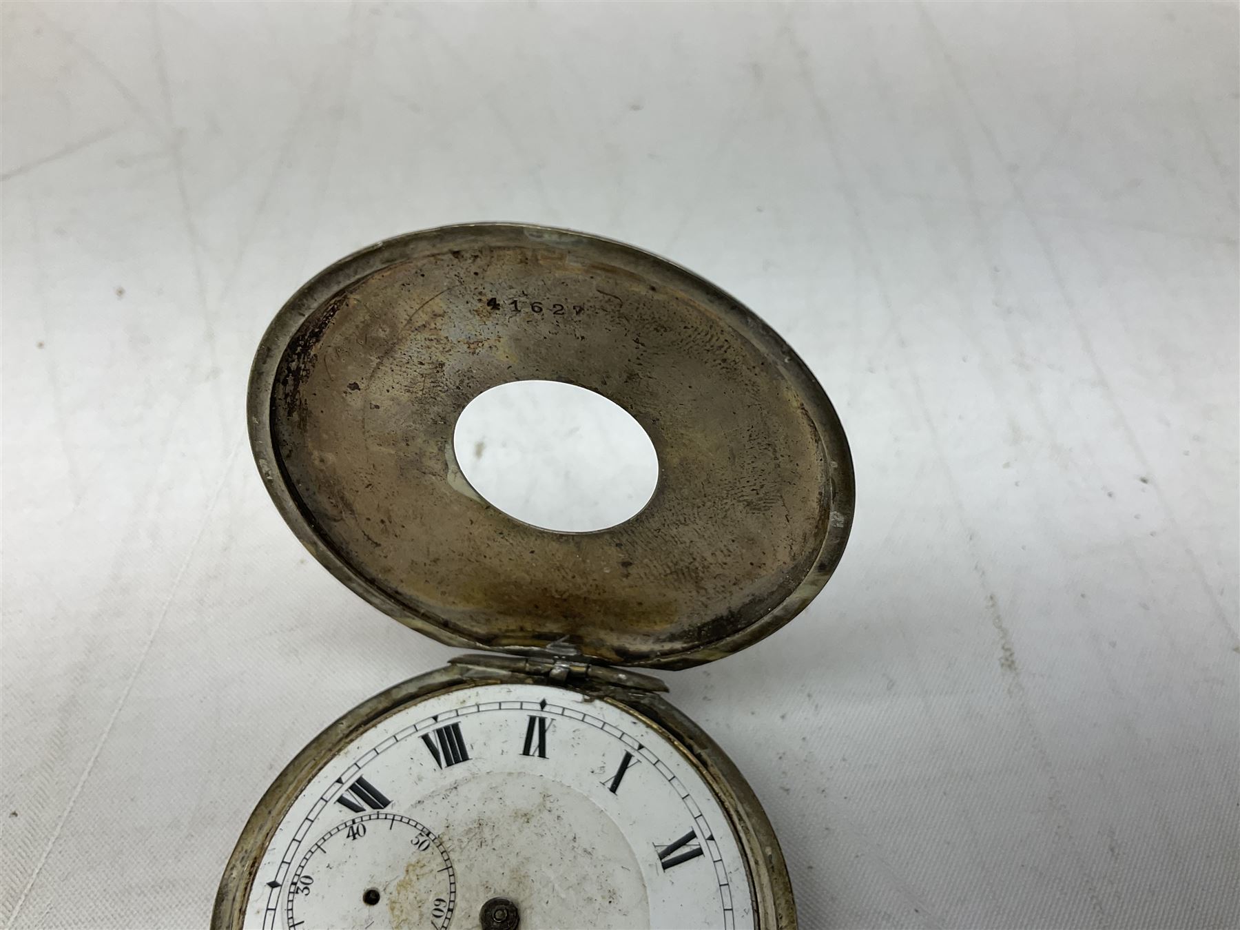 Miniature all nickel 2mm pin fire single shot pistol with engraved grip L4.5cm; together with a .925 silver half hunting cased keyless wind pocket watch inscribed 'Presented to Pte. P. Sizer By No.2 Company 1st Battalion Lincolnshire Regmt For Gallant Conduct Nr. Cork (Ireland) 31.7.20' (2)