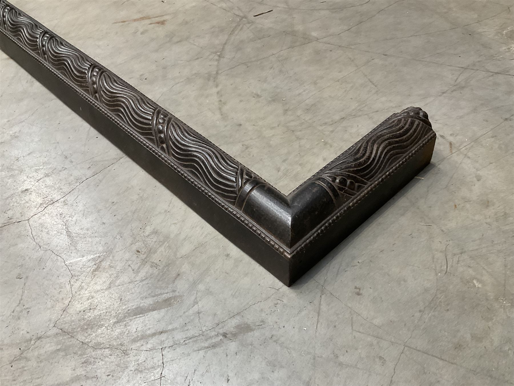 Black painted wrought iron fire guard , wicker log basket with stand, coal bucket and a fire kerb (4)