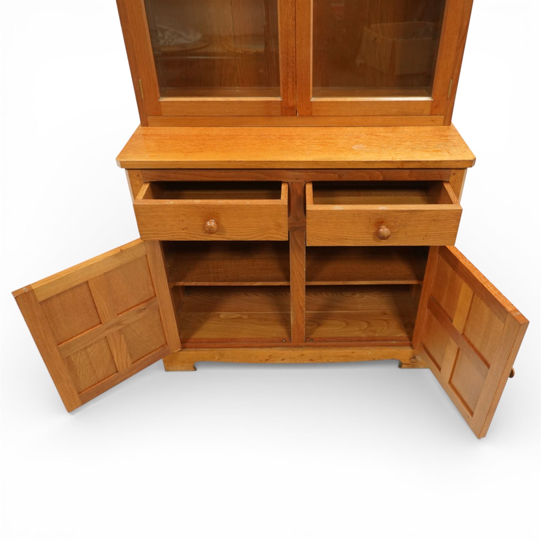 Unicornman - oak display bookcase on cupboard, Geoff Gell of Coxwold