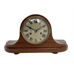 1950s German striking mantle clock in a mahogany case.