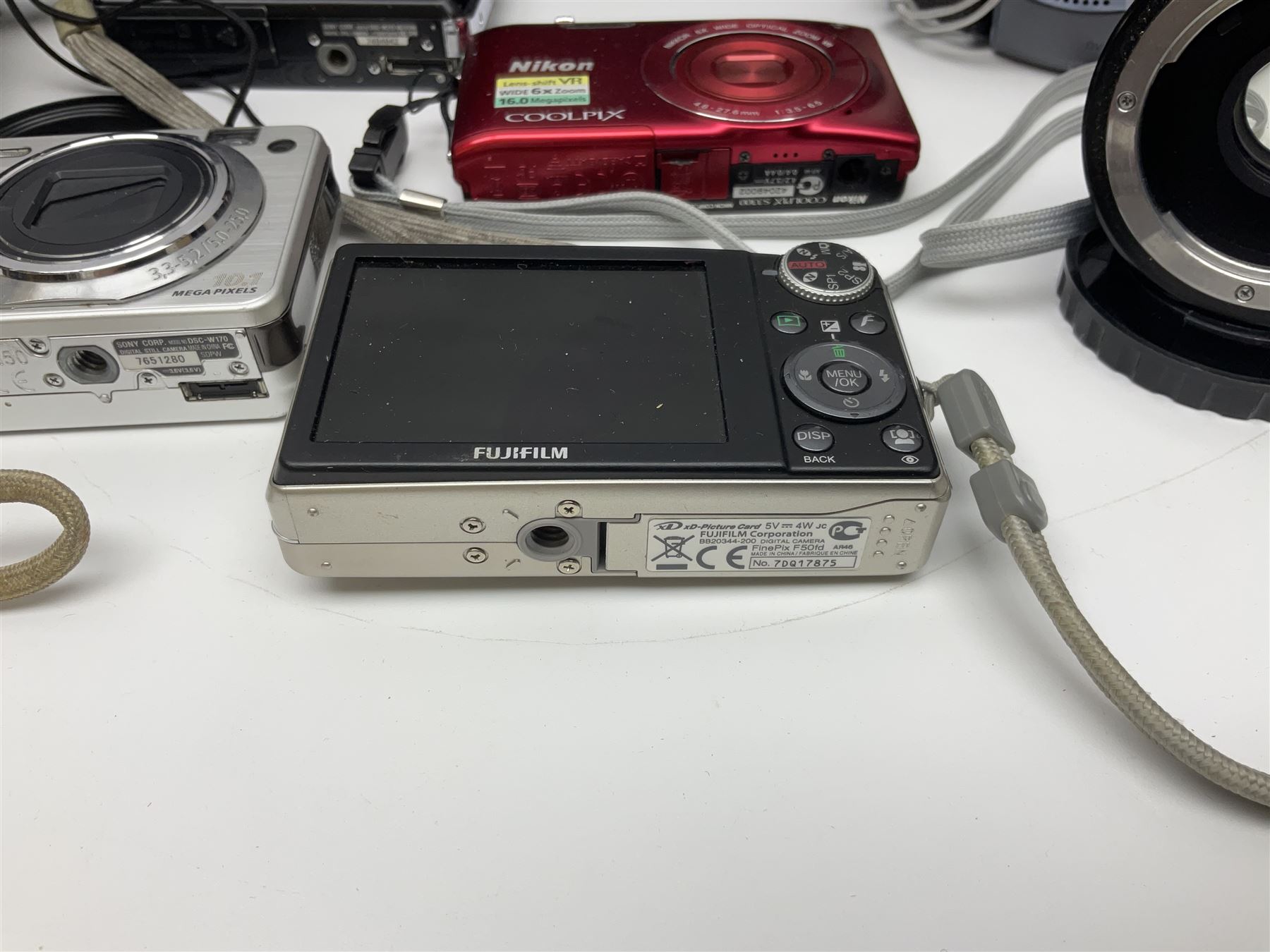 Nikon Coolpix 8700 camera body, serial no 3220838, with Zoom Nikkor Ed 8.9-71.2mm 1:2.8-4.2 lens, together with Canon digital video camcorder and other digital cameras and camera equipment