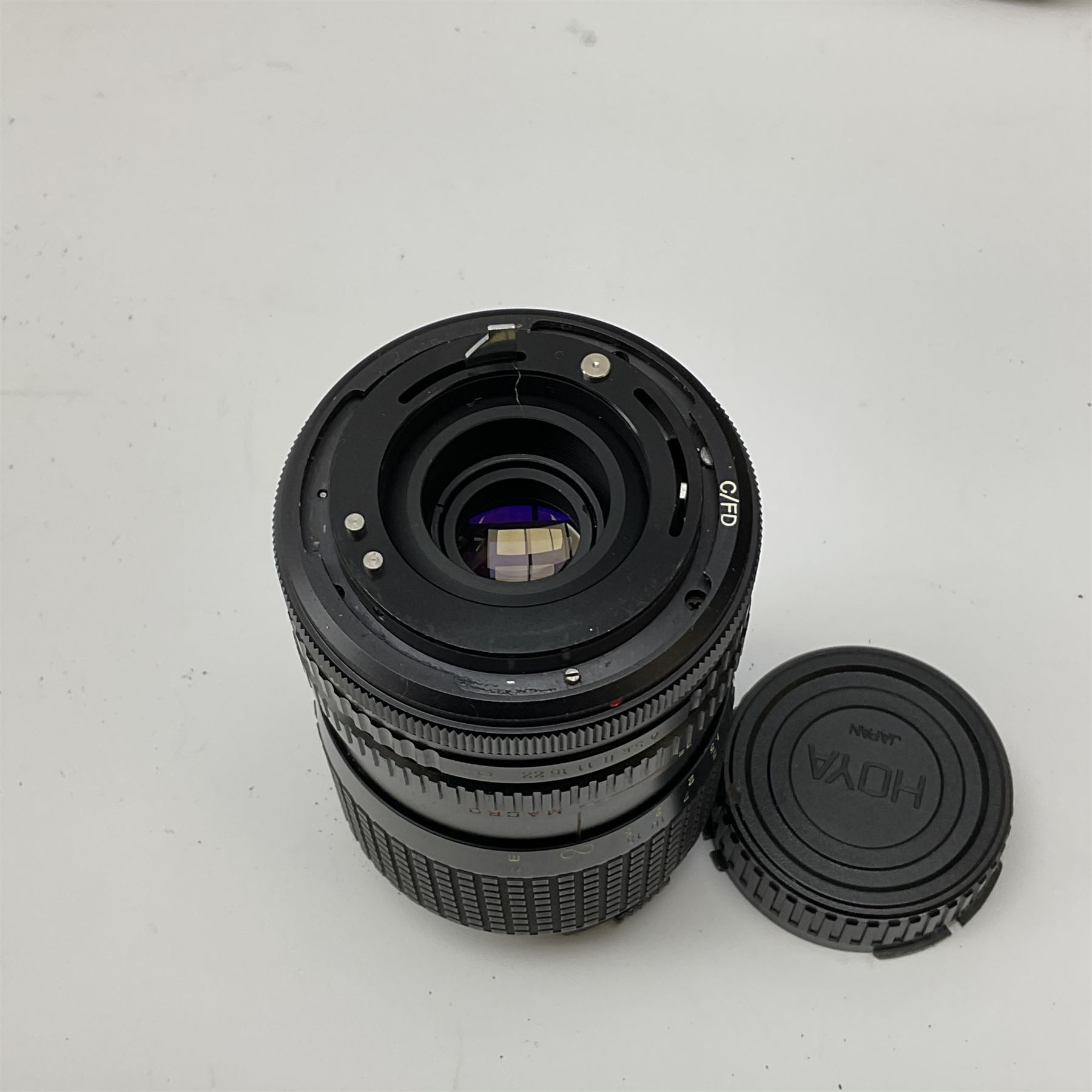 Canon AE1 camera, 'no. 4403757', fitted with Canon 'FD 50mm 1:1.8' lens, Hoya 'HMC Wide-Auto f24mm 1:2.8' lens and various other lenses and camera accessories, housed in a soft carry bag