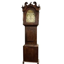 Late 19th century mahogany 8-day Yorkshire longcase clock c 1880, makers name indistinct, With a swans necked pediment with wooden turned finials and paterie, ring turned pilasters and a short trunk door, on a broad plinth raised on bun feet, painted dial with a dished centre and rural scenes to the arch and spandrels, with Roman numerals, brass stamped hands, subsidiary seconds and date dials, dial pinned directly to a rack striking movement, striking the hours on a bell. With weights and pendulum.