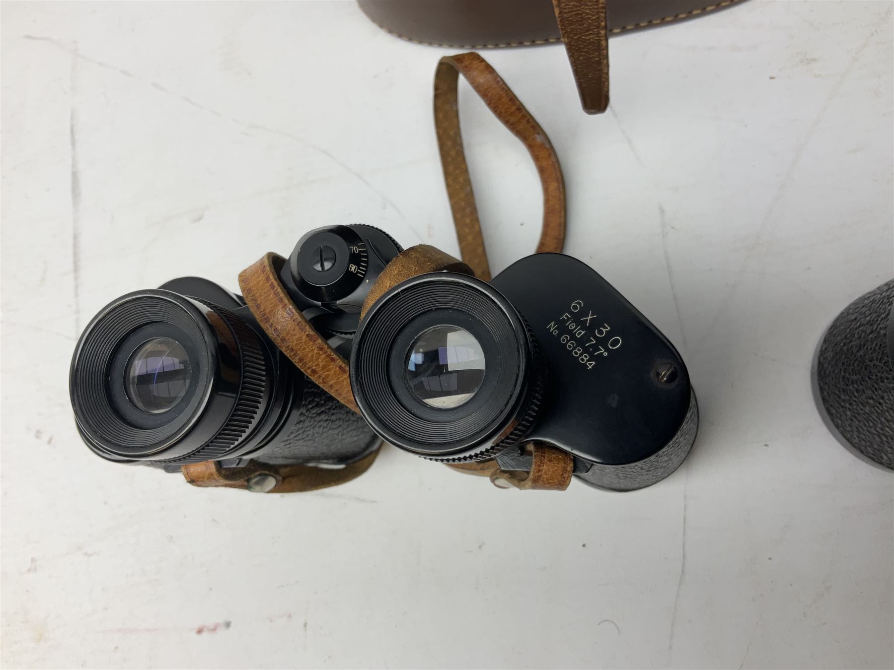 Eleven pairs of binoculars, to include Zeiss Wetzler 20x50, Taylor-Hobson Bino Prism No.2 Mk.III military stamped 1943 with broad arrow,  Swift Tecnar 16x50, J.T Coppock Oceanic Bloomed 10x50, Hensoldt Wetzlar Dialyt 7x42 etc