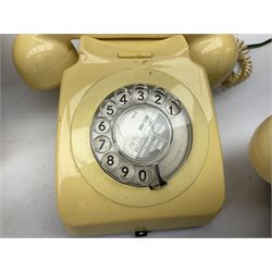 Four cream coloured telephones with rotary dials, to include three examples marked  PO 21034 beneath, including EET 79/2, 746F EET 79/3, 706L PXA 65/2A etc