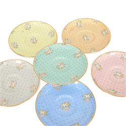 Spode six coffee cups and saucers cased set, decorated with floral sprigs on a polka dot ground with gilt detail