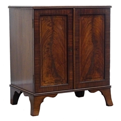  Regency ebony strung mahogany medal or coin collectors cabinet, with reeded top, two panel doors enclosing eleven drawers, shaped outsplayed bracket feet, W61cm, H68cm, D40cm  