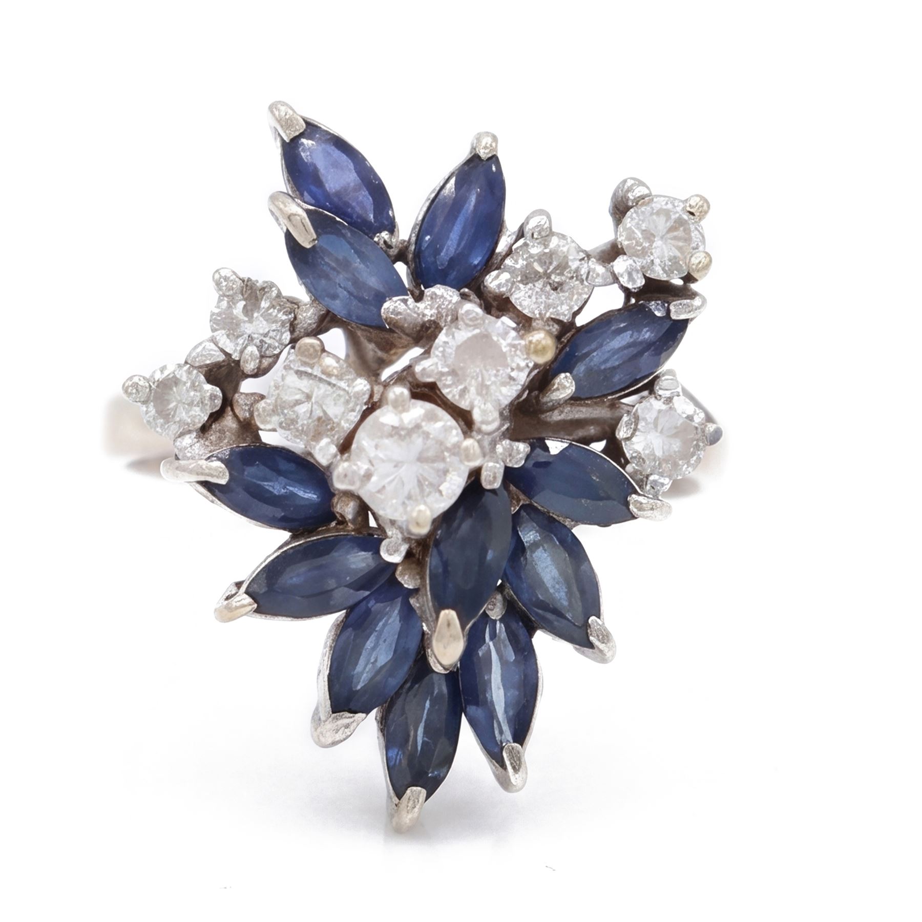 White gold sapphire and diamond cluster ring, set with eight round brilliant cut diamonds and twelve marquise cut sapphires, stamped 18ct, total diamond weight approx 0.45 carat
