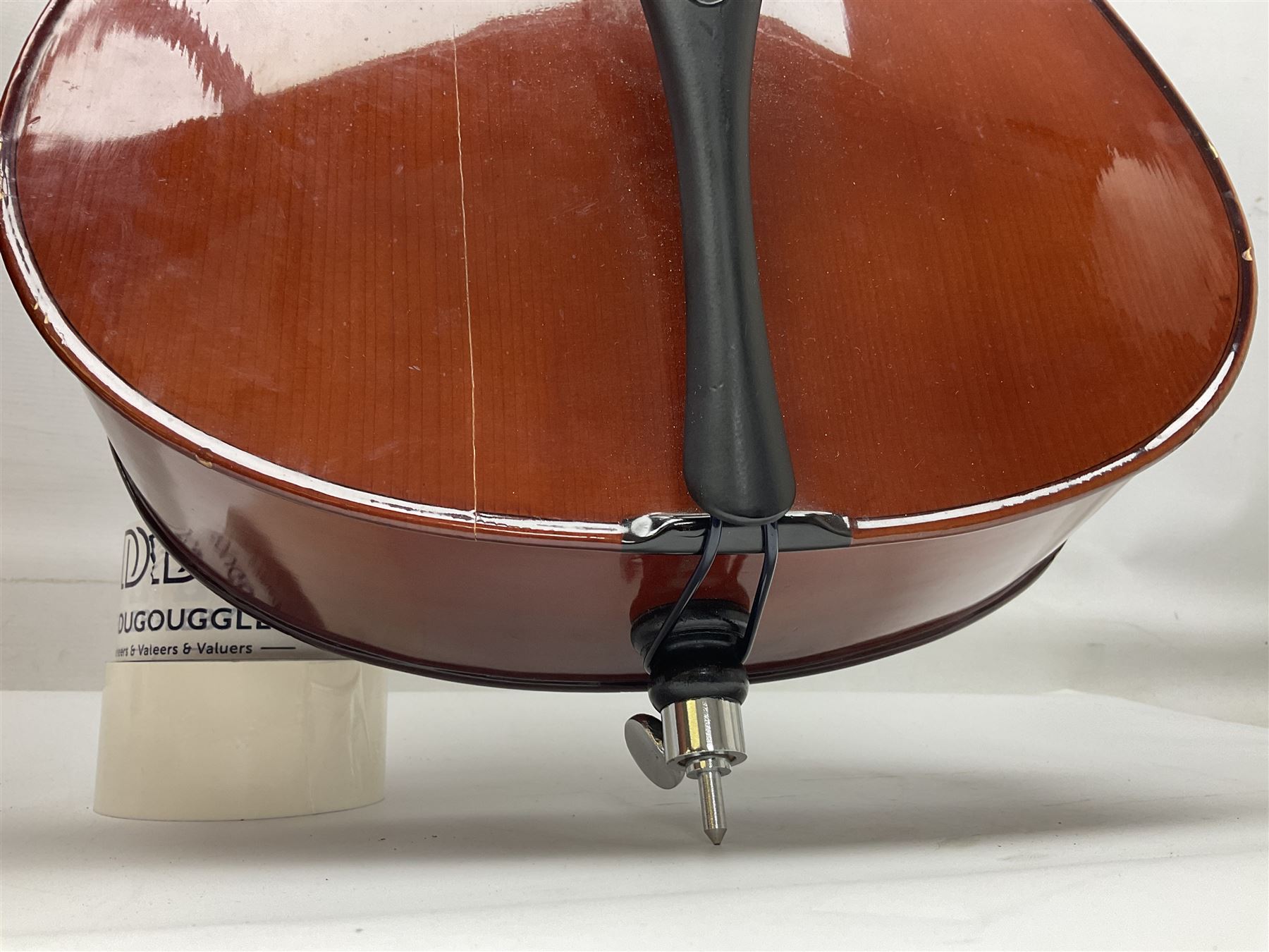 Modern Hungarian half-size cello with 69cm two-piece maple back and ribs and spruce top L114cm overall; and Stentor half size cello bearing label 'The Stentor Student II'; each in soft carrying case (2)