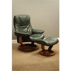  Ekornes Stressless swivel reclining armchair upholstered in green leather with matching footstool  
