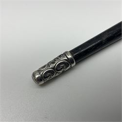 Two early 20th century conductor's ebonised batons each with three silver mounts; one hallmarked London 1915 with presentation plaque 'I.O.R. Presented to Mr. J.R. Maddock 4.1.17' L52cm; the other hallmarked Chester 1908 with vacant cartouche L51.5cm (2)